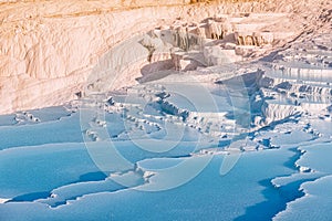 Pamukkale the main natural wonder of Turkey and the Middle East. White travertines with thermal water. It is a very popular