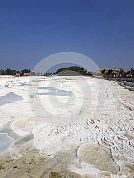 Pamukkale is a natural area in Denizli province. The City Spas are made up of carbonate mineral terraces and travertines left over
