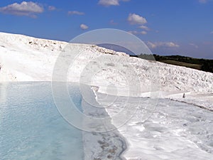 Pamukkale termal waters with the white rocks photo