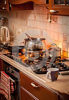 Pan boiling on burning gas stove on country style kitchen