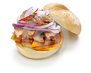 Pan con chicharron, peruvian pork sandwich photo