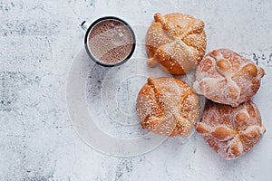 Pan de Muerto and hot chocolate, Mexican bread traditional for day of the Dead in Mexico