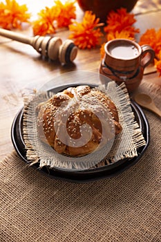 Pan de Muerto with sesame seeds and Hot Chocolate photo