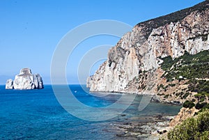 Pan di Zucchero rocks in the sea and Masua's sea stack (Nedida),