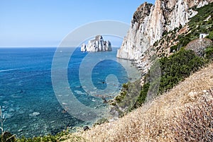 Pan di Zucchero rocks in the sea and Masuas sea stack (Nedida),