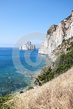 Pan di Zucchero rocks in the sea and Masuas sea stack (Nedida),