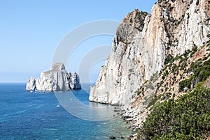 Pan di Zucchero rocks in the sea and Masuas sea stack (Nedida),