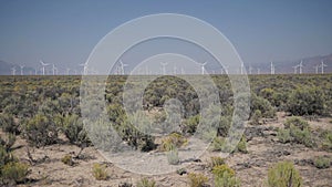 Pan Down of a windfarm in the desert