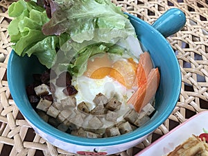 Pan eggs with various topping in Thailand.