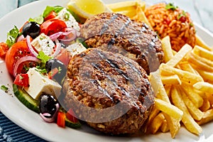 Pan-fired bifteki or frikadelle with Greek salad