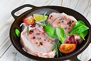 Pan of Fresh raw pork meat with pepper