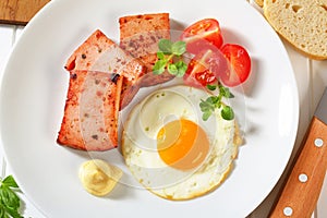 Pan-fried Leberkase with sunny side up fried egg