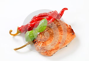 Pan-fried pork chop with chili peppers