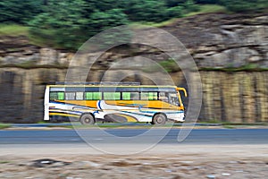 Pan image of Private travels bus , speeding towards Mumbai.