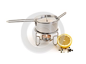 Pan for mulled wine preparation and lemon