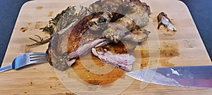 Pan-Seared duck in butter cut on the cutting board