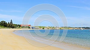 Pan shot of the beautiful beach and blue seawater in La Perouse in Sydney