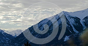 Pan shot of Colorado mountains on gloomy day