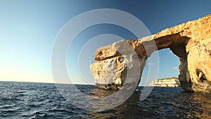 Pan shot view of Azure Window, known as Tieqa ?erqa, a natural rock formation on the coast of Gozo island, Malta