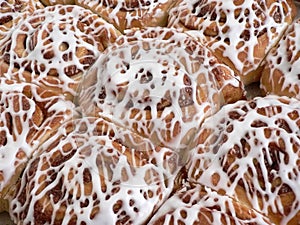 Pan of sweet rolls with frosting