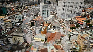Pan Up - Tilt Shift View of Ho Chi Minh City Vietnam from Above