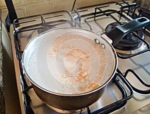 Pan in use, while cooking pasta