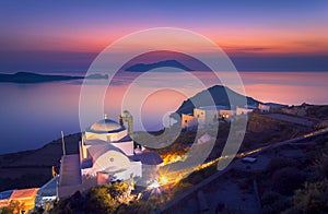 Panagia Thalassitra church and Plaka village view at sunset, Milos island, Cyclades.