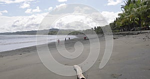 Panama Armuelles, some boys play on the beach with the ball