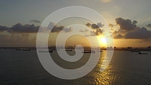 Panama Canal Cargo Port. View of a maritime container port and its cranes during a beautiful sunrise. A logistics and