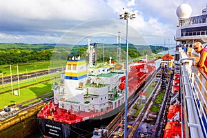 Panama Canal, Panama - December 7, 2019: A cargo ship entering the Miraflores Locks in the Panama Canal