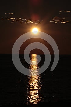 Panama city beach florida moonset over the gulf of mexico