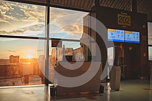 Panama City, Panama: Boarding gate entrance with information board in airpot Panama City, Panama.