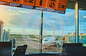 Panama City, Panama: Boarding gate entrance with information board in airpot Panama City, Panama.