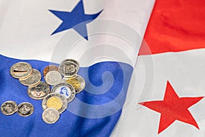 Panama flag and Panamanian coins called Balboa, Economic and business concept