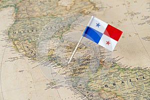 Panama flag pin on world map