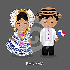 Panamanians in national dress with a flag.