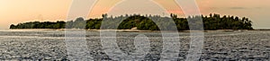 Panaroma sunset of island photo