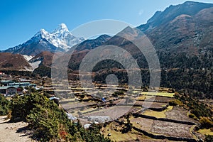 Panboche or Pangboche settlement is a small village on 3985m altitude with Ama Dablam 6812m picturesque mountain summit on the photo