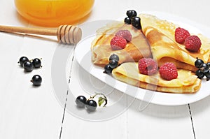 Pancake - Crepes with berries and honey