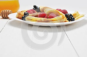 Pancake - Crepes with berries and honey
