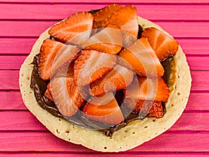 Pancake With Fresh Sliced Strawberries and Chocolate Spread