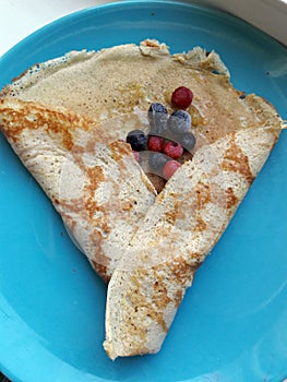 Pancake with frozen berries