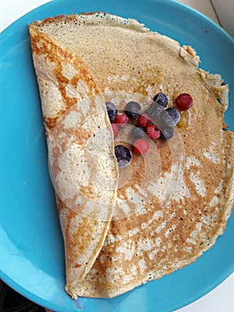 Pancake with frozen berries