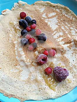 Pancake with frozen berries