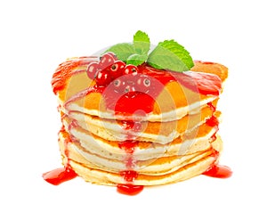 Pancake with red currant sauce and mint