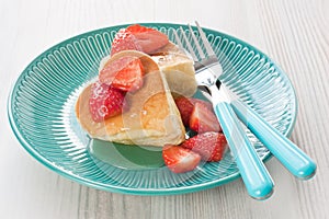 Pancake souffle with fresh strawberry in form hearts
