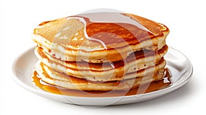 Pancake stack with maple syrup on white plate