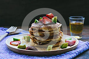 Pancake strawberry avocado fruit and honey syrup sweeet dessert