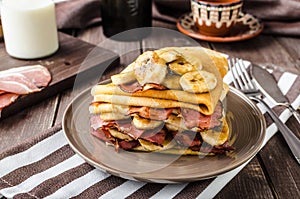 Pancakes with bacon, banana and maple sirup