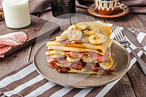 Pancakes with bacon, banana and maple sirup